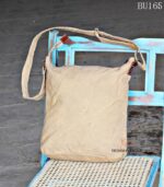 Beige canvas sling bag with vintage stamp print, handcrafted Rajasthan, BU165