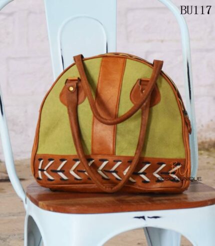 Colorblock fabric and leather round duffle bag with lace-up detail, handcrafted Rajasthan, BU117