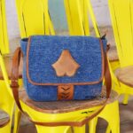 Denim fabric sling bag with tan leather trim and leaf appliqué, handcrafted Rajasthan, BU114
