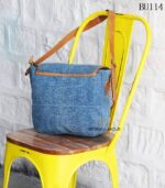 Denim fabric sling bag with tan leather trim and leaf appliqué, handcrafted Rajasthan, BU114