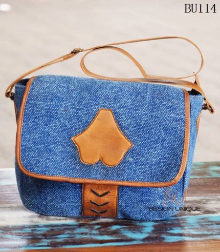 Denim fabric sling bag with tan leather trim and leaf appliqué, handcrafted Rajasthan, BU114