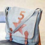 Grey canvas messenger bag with leather star appliqué and buckle straps, handcrafted Rajasthan, BU131