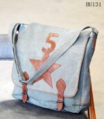Grey canvas messenger bag with leather star appliqué and buckle straps, handcrafted Rajasthan, BU131