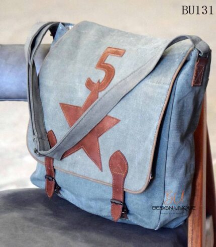 Grey canvas messenger bag with leather star appliqué and buckle straps, handcrafted Rajasthan, BU131