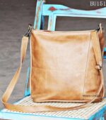 Handcrafted tan leather crossbody bag with front zip pocket, Rajasthan-made, BU151