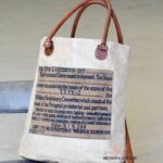 Natural canvas tote bag with vintage text print and leather handles, handcrafted Rajasthan, BU136