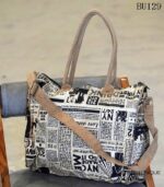 Newspaper print canvas duffle bag with tan leather trim, handcrafted Rajasthan, BU129
