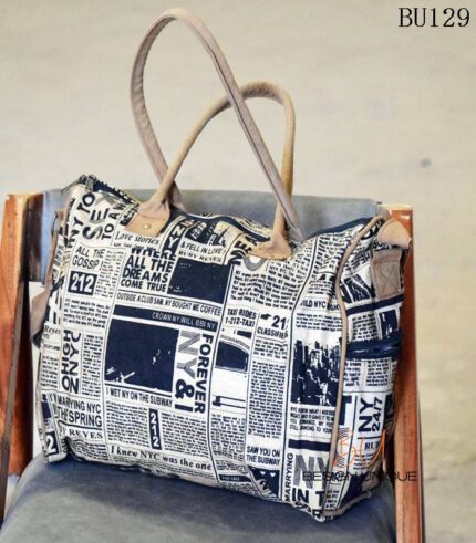 Newspaper print canvas duffle bag with tan leather trim, handcrafted Rajasthan, BU129