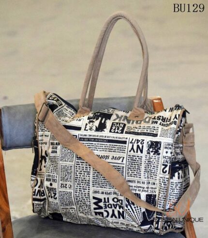 Newspaper print canvas duffle bag with tan leather trim, handcrafted Rajasthan, BU129