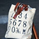 Off-white canvas tote bag with vintage numeral print and leather handles, handcrafted Rajasthan, BU173