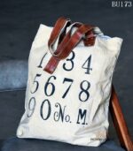 Off-white canvas tote bag with vintage numeral print and leather handles, handcrafted Rajasthan, BU173