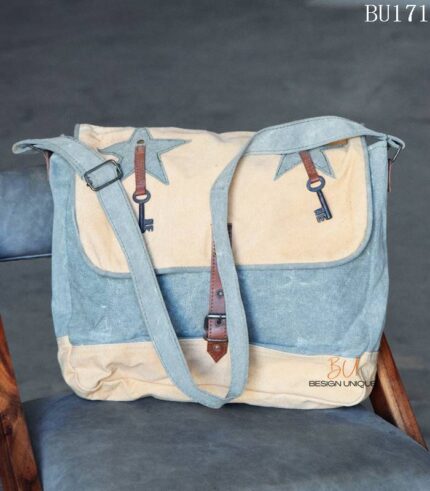 Two-tone blue-grey canvas messenger bag with star appliqué and key charms, handcrafted Rajasthan, BU171