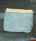Two-tone blue-grey canvas messenger bag with star appliqué and key charms, handcrafted Rajasthan, BU171