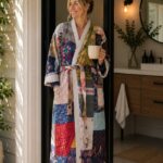 Woman wearing blue and cream patchwork kantha robe with ivory trim, Rajasthan-made vintage sari robe