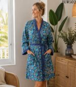 Woman wearing blue floral hand block-print cotton kimono robe with contrast trim, Rajasthan-made loungewear BUW502