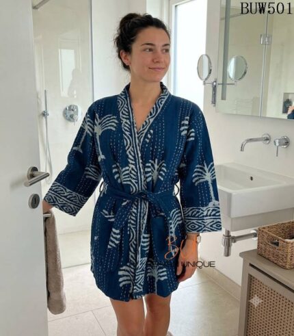 Woman wearing indigo kantha cotton kimono robe with hand-stitched palm print, reversible unisex loungewear from Rajasthan BUW501