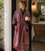 Woman wearing maroon and ivory ajrakh-style kantha robe with color-block trim, luxury designer robe from Rajasthan BUW511