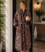Woman wearing navy and rust striped tapestry print cotton robe with navy trim, handcrafted in Rajasthan BUW513