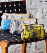 Set of 3 kantha-quilted cotton patchwork pouches, handmade in India. Sustainable, one-of-a-kind design. Wholesale & private-label export.