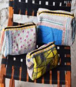 Set of 3 kantha-quilted cotton patchwork pouches, handmade in India. Sustainable, one-of-a-kind design. Wholesale & private-label export.